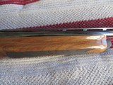 Remington 1100 Sporting 12 Ga with 28 inch Remchoke Barrel ( Beautiful wood) - 3 of 11