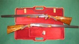 Exquisite Pair of James Woodward & Sons 20 GA Over/ Under Sidelock Ejector Shotguns Engraved Set With Case - 1 of 15