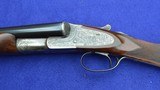 LC. Smith 12-Gauge Specialty Grade, 32-Inch Barrels, Beavertail Forend,
Substantial Original Case Color, Mfg. 1922 - 15 of 20