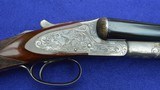 LC. Smith 12-Gauge Specialty Grade, 32-Inch Barrels, Beavertail Forend,
Substantial Original Case Color, Mfg. 1922 - 4 of 20