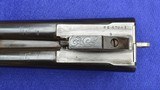 LC. Smith 12-Gauge Specialty Grade, 32-Inch Barrels, Beavertail Forend,
Substantial Original Case Color, Mfg. 1922 - 18 of 20