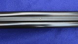 LC. Smith 12-Gauge Specialty Grade, 32-Inch Barrels, Beavertail Forend,
Substantial Original Case Color, Mfg. 1922 - 19 of 20