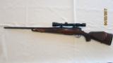 Pre-Owned Colt-Sauer Sporting Rifle in 300 Win Mag, including as-new Redfield Widefield 3 X 9 Scope - 1 of 5