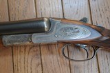 L.C. SMITH GRADE 5E,
ENGRAVED 12 GAUGE SHOTGUN WITH 32 INCH BARRELS AND SINGLE TRIGGER - 1 of 15