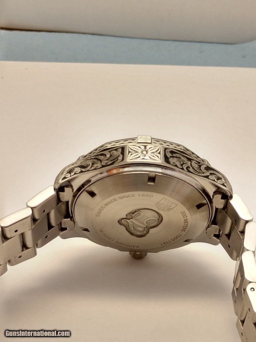 Engraved tag on sale heuer watch