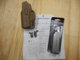Kahr Arms PM9 (7) round mag and BlackDog Concealment IWB holster - 1 of 3
