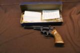 NIB Smith & Wesson 17-3 6" .22 LR Original box tools and receipt
- 1 of 13