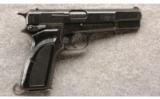 Browning Hi-Power 9MM, 13 Round Mag, Fixed Sights, Black Refinish, Synthetic Grips. - 1 of 3