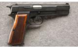 Browning Hi-Power 9MM, 13 Round Mag, Fixed Sights, Matte Finish, Wood Grips. - 1 of 3