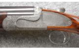 Holland & Holland Sporting Deluxe 20 Bore/Gauge Sport & Game Gun. J. G. Salt Masterfully Engraved, in the MarkerÂ?s case. - 7 of 9