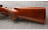 Ruger M77 in 7MM Rem Mag, Round Top, Tang Safety, Express Sights, Red Pad - 7 of 7
