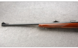 Ruger M77 in 7MM Rem Mag, Round Top, Tang Safety, Express Sights, Red Pad - 4 of 7