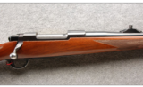 Ruger M77 in 7MM Rem Mag, Round Top, Tang Safety, Express Sights, Red Pad - 2 of 7