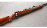 Ruger M77 in 7MM Rem Mag, Round Top, Tang Safety, Express Sights, Red Pad - 1 of 7