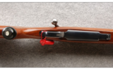 Ruger M77 in 7MM Rem Mag, Round Top, Tang Safety, Express Sights, Red Pad - 3 of 7