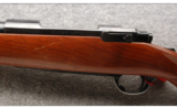 Ruger M77 in 7MM Rem Mag, Round Top, Tang Safety, Express Sights, Red Pad - 5 of 7