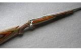 Ruger M77 Hawkeye Laminate Stainless Steel in .22-250 Rem, Like New In Box - 1 of 7