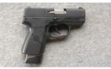Kahr PM9 In The Case 9 MM with 4 Extra Mags and Trijicon Night Sights. - 1 of 3
