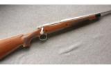 Remington 700 in 7MM Rem Mag, Stainless Fluted with Walnut stock ANIB - 1 of 7