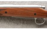 Remington 700 in 7MM Rem Mag, Stainless Fluted with Walnut stock ANIB - 4 of 7