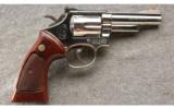 Smith & Wesson 19-4 in .357 Magnum, 4 Inch Nickel. - 1 of 3