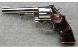Smith & Wesson 25-5,.45 Long Colt, 6 Inch Nickel In a Metal Case. - 2 of 2