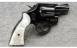 Smith & Wesson Model 10-5 in .38 Special, Synthetic Pearl Grips. - 1 of 2