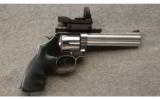 Smith & Wesson 686-6
in .357 Magnum With Browning Holo Sight and Case. - 1 of 3