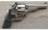 Smith & Wesson Model 657-3 In .41 Rem Mag 6 Inch Stainless In Factory Case. - 1 of 3