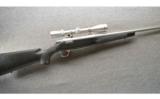 Browning A-Bolt Left Hand Stainless Steel Stalker With BOSS and Leupold Scope - 1 of 9