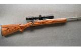 Winchester Model 70 Coyote Stainless Laminate in 243 Win - 1 of 9