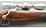 Winchester Model 70 Classic Stainless in .30-06 Sprg With Leupold Veri-X III Scope - 2 of 9