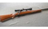 Ruger M77 in 7 MM Rem Mag, Red Pad Tang Safety In The Box - 1 of 9