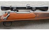 Remington Model 700 in 7mm Rem Mag With Scope - 2 of 9