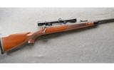 Remington Model 700 in 7mm Rem Mag With Scope - 1 of 9