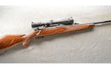 Weatherby Mark V Deluxe in 7MM Wby Mag With Leupold 4.5-14 AO Scope - 1 of 9