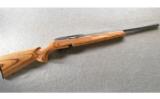 Remington Model 597 Magnum in .22 Mag, Heavy Barrel, Laminate Stock - 1 of 9