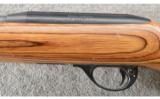 Remington Model 597 Magnum in .22 Mag, Heavy Barrel, Laminate Stock - 4 of 9