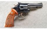 Smith & Wesson Model 19-4 in .357 Magnum, 4 Inch Blue in the Factory Box - 1 of 4