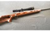 Remington ~ 700 SS LAM TN ~ 7MM Rem Mag ~ Leupold Scope - 1 of 9