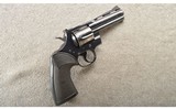 Colt ~ Python 4" blue ~ .357 Magnum. - 1 of 4
