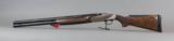 Benelli 828U Field Nickle 12GA 26" Barrel Shotgun
- 1 of 10