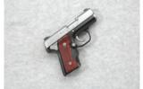 Kimber Model Solo CDP 9mm with Crimson Trace Grip - 1 of 2
