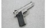 Smith & Wesson Model 4566 SS .45 A.C.P. - 1 of 2