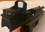 Springfield Armory XDm 45 3.8 with Burris Red Dot and Four Magazines 45 ACP - 6 of 8 Springfield Armory XDm 45 3.8 with Burris Red Dot and Four Magazines 45 ACP - 6 of 8