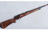 Winchester Model 70 Super Grade Featherweight 7mm Mauser (7x57) - 1 of 8