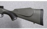 Weatherby Vanguard Synthetic w/Muzzle Brake .257 Wby. Mag. - 7 of 9