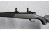 Weatherby Vanguard Synthetic w/Muzzle Brake .257 Wby. Mag. - 4 of 9