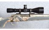 Remington Model 700 SPS Stainless Camo .300 Rem. Ultra Mag. - 2 of 9