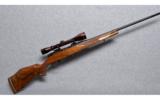 Weatherby Mark V Deluxe Left Hand +Scope .257 Wby. Mag. - 1 of 9